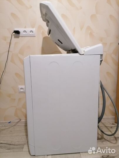 Стиральная машина с вертикальной загрузкой