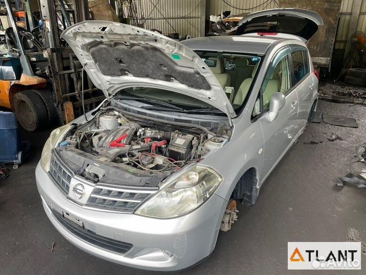 Капот nissan tiida