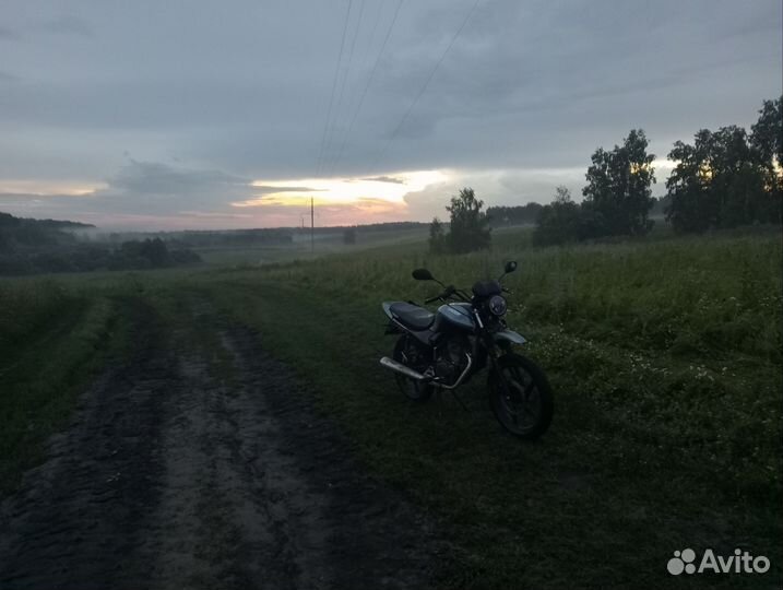 Мотоцикл рейсер