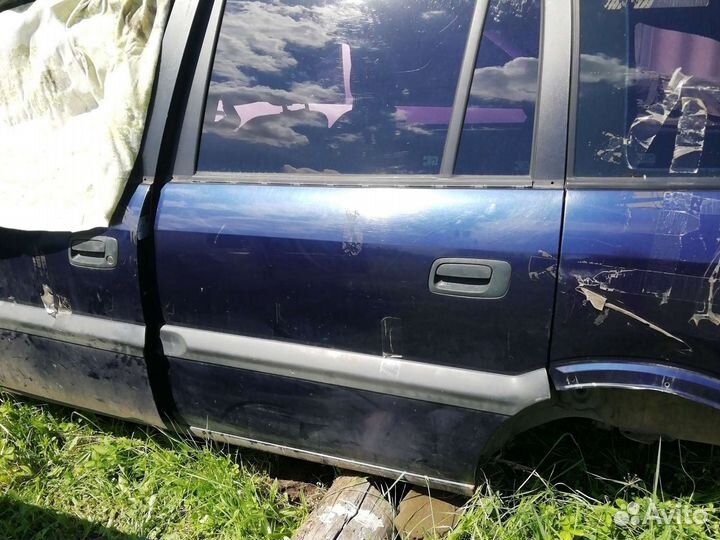 Дверь задняя левая зафира а