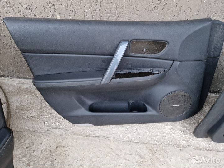 Дверные карты (обшивка дверей) на мазду GG6