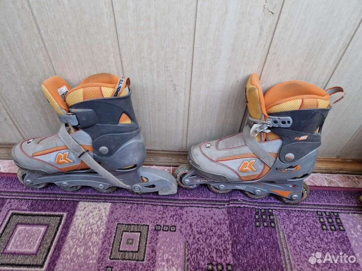 Роликовые коньки