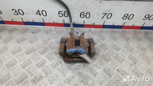 Суппорт тормозной задний правый toyota corolla E12