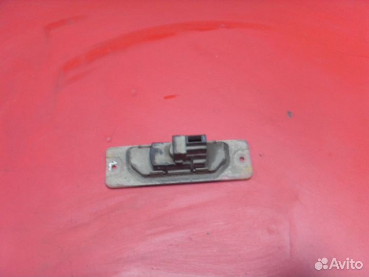 Фонарь подсветки номера 265103J100 Nissan Pulsar