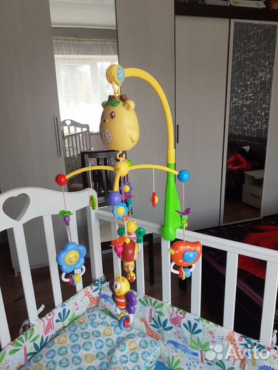 Детский мобиль в кроватку музыкальный