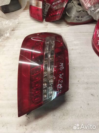 Фонарь левый наруж Mercedes E207 bs7113405c