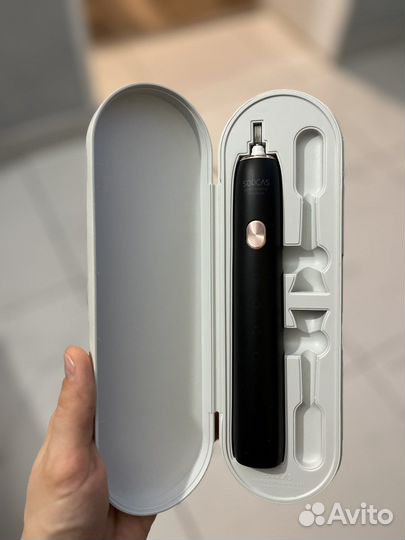 Электрическая зубная щетка