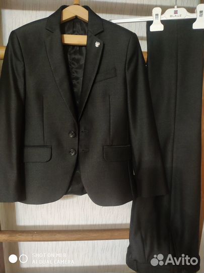 Школьный костюм для мальчика 134 серый