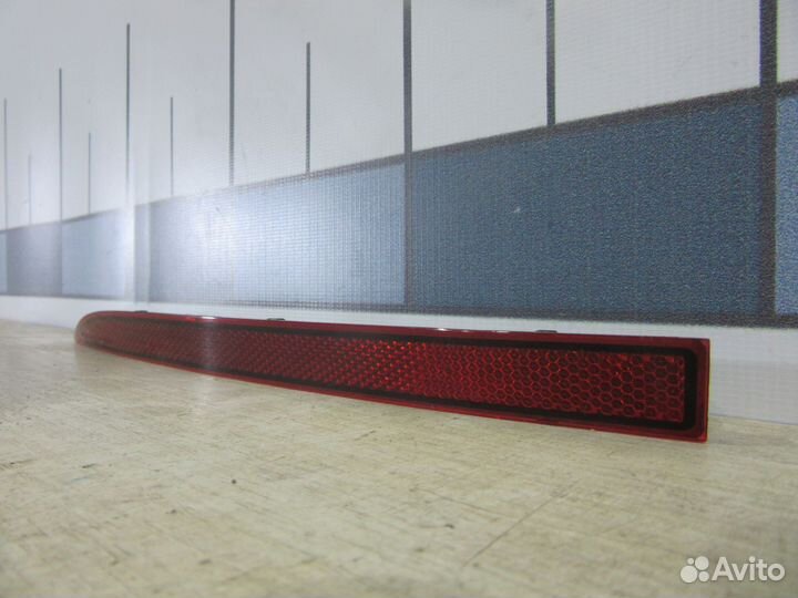 Отражатель в бампер задний левый VW Touareg