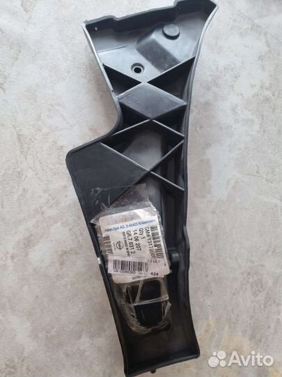 Кронштейн переднего бампера левый general motors