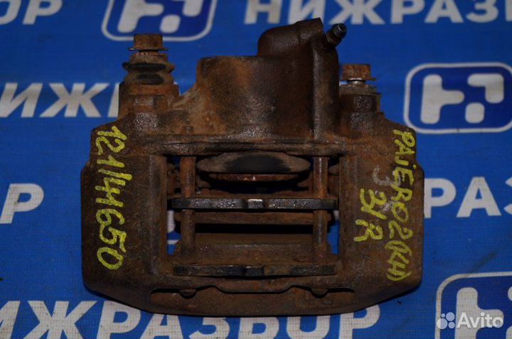 Суппорт задний правый Mitsubishi Pajero Sport 2 KH