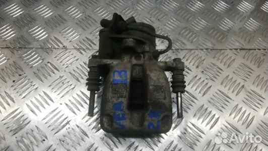 Суппорт тормозной задний правый volkswagen passat