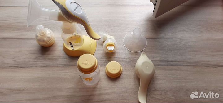 Ручной молокоотсос Medela со смартсоской Calma