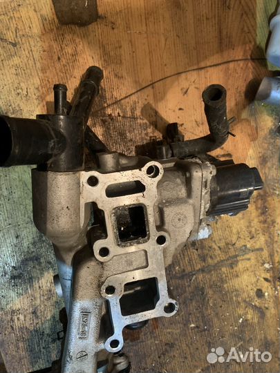 Корпус термостата для hyundai santa fe 4 (TM)