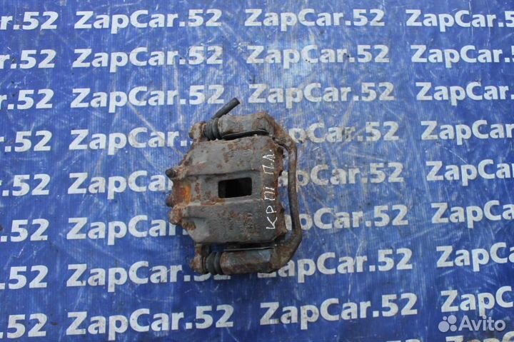 Суппорт передний левый Киа Рио 2