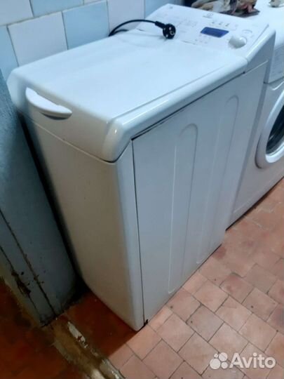 Стиральная машина с вертикальной загрузкой