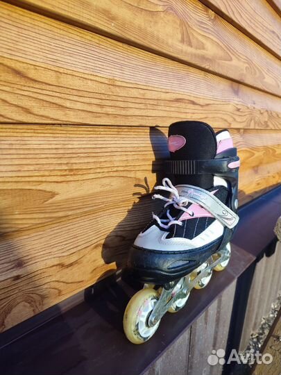 Роликовые коньки