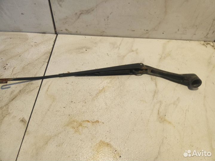 Поводок стеклоочистителя левый Mitsubishi Lancer 9