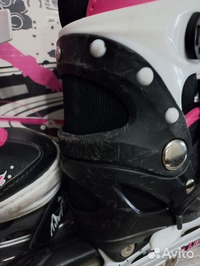 Роликовые коньки