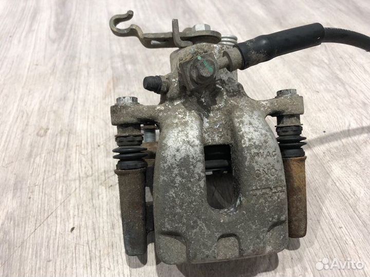 Суппорт тормозной задний правый Skoda Octavia A7