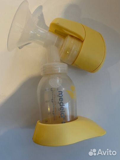 Молокоотсос medela электрический