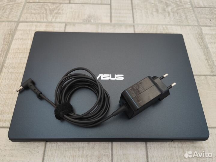 Asus E210KA