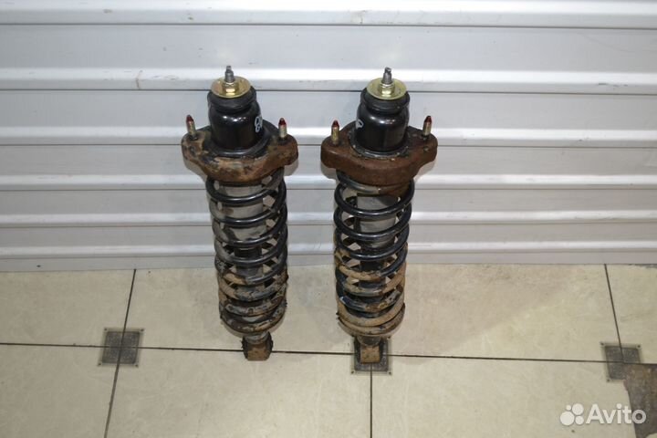 Стойка (амортизатор) задняя Mitsubishi Lancer 9