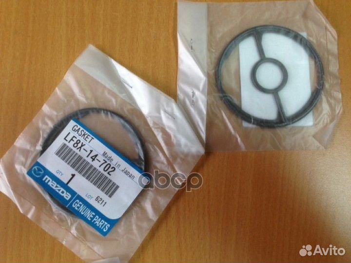 Прокладка масляного фильтра LF8X14702 mazda