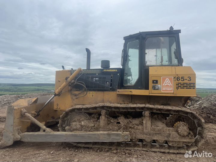 Машинист бульдозера