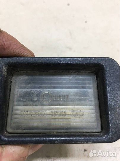 Фонарь подсветки номера Nissan Primera
