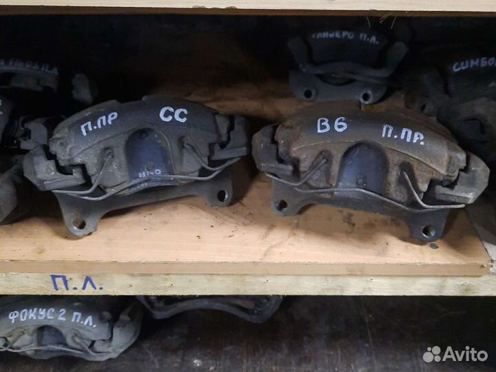 Супорт передний Volkswagen Passat B6,сс