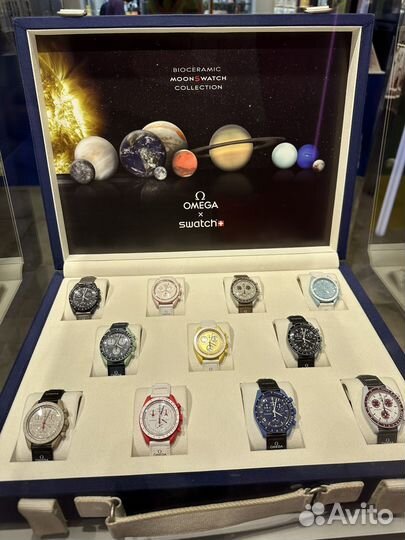 Часы swatch omega mission on earth