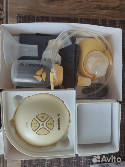 Молокоотсос medela swing электрический