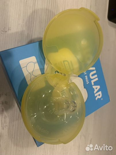 Молокоотсос ручной + новые накладки medela