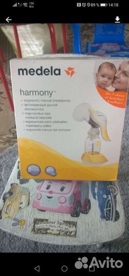 Молокоотсос medela