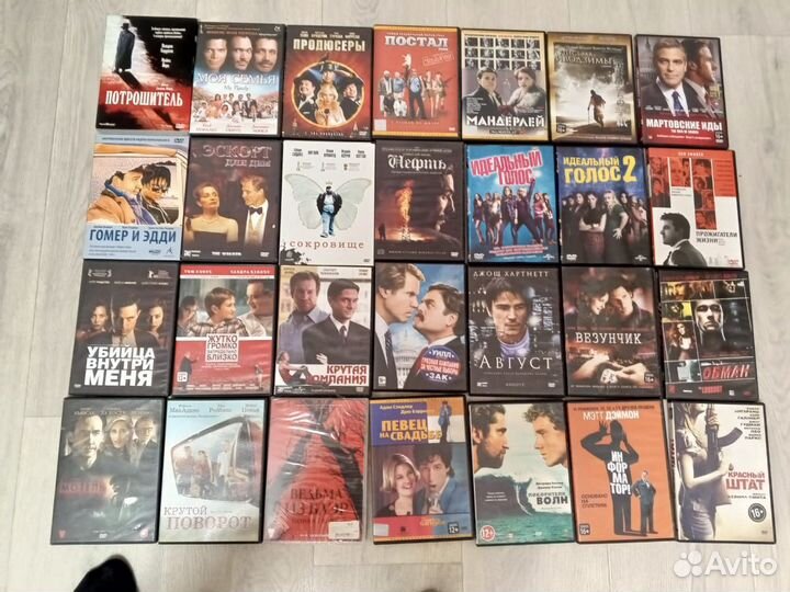 Фильмы DVD по одному на диске