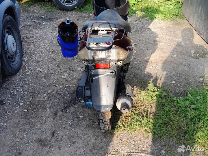 Скутер Omaks motors