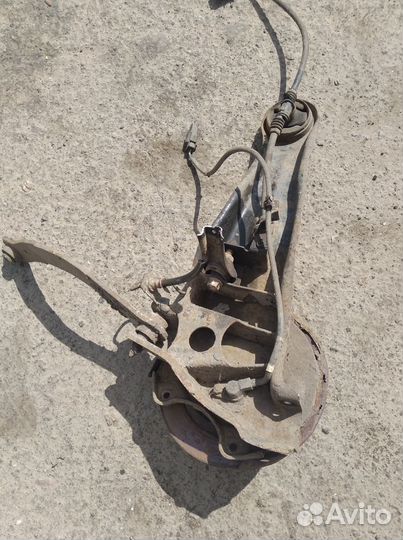 Задний левый кулак Митцубиси лансер 9