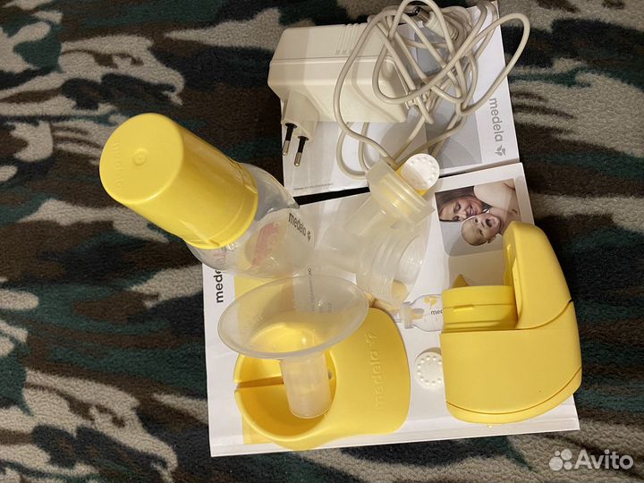 Молокоотсос medela электрический