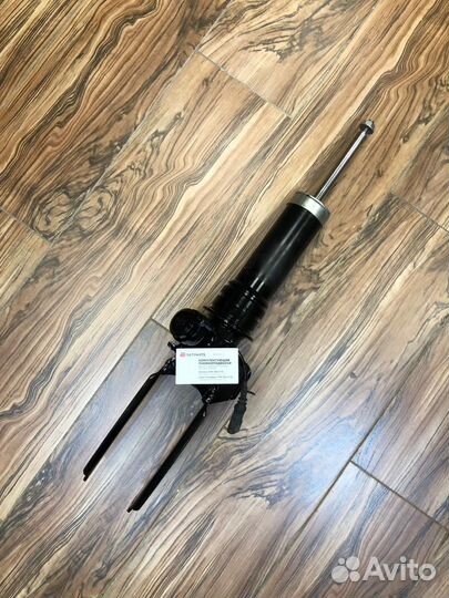 Передний левый амортизатор на Cayenne 955,957