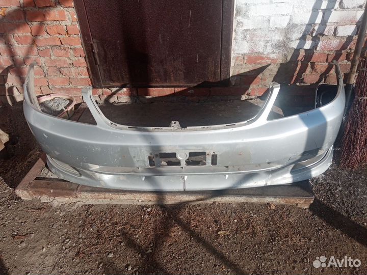 Бампер передний toyota corolla fielder 121