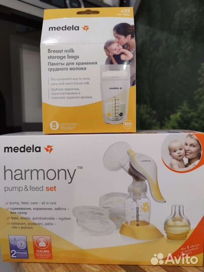 Молокоотсос medela ручной + смартсоска
