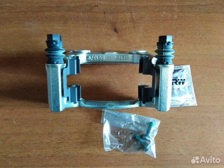 Скоба суппорта задняя Volkswagen Touran 2003-2005