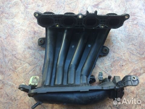 14001EE00B Коллектор впускной Nissan Note E11