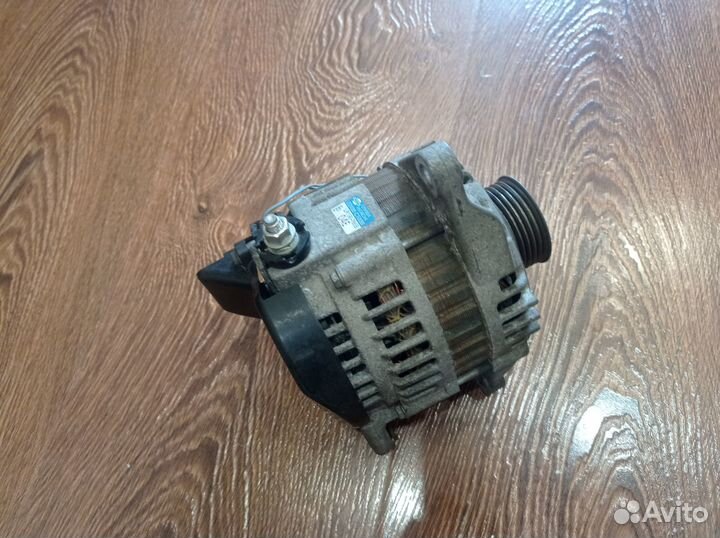 Генератор Nissan March 12V90A 23100 CT00B