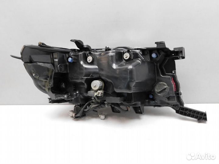 Фара левая Toyota Land Cruiser