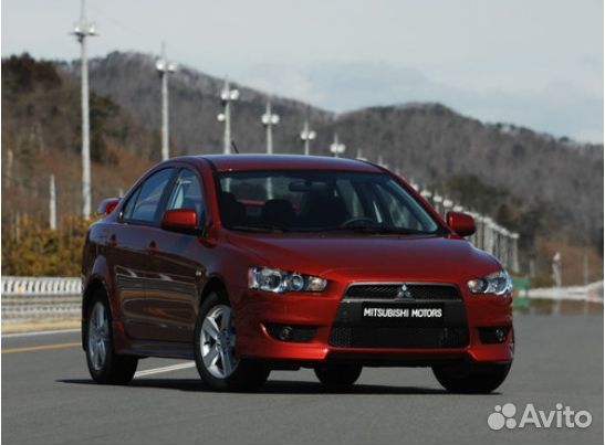 Стекло фары Mitsubishi Lancer 10