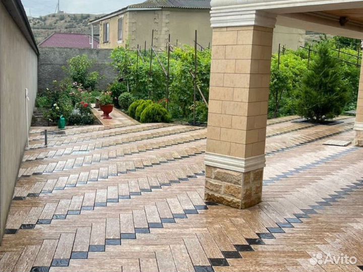 Укладка тротуарной плитки брусчатки бордюров