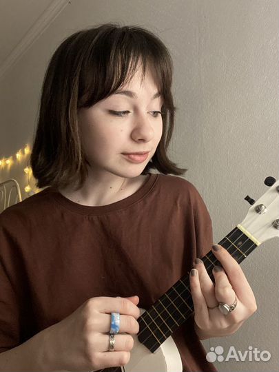 Учитель по укулеле