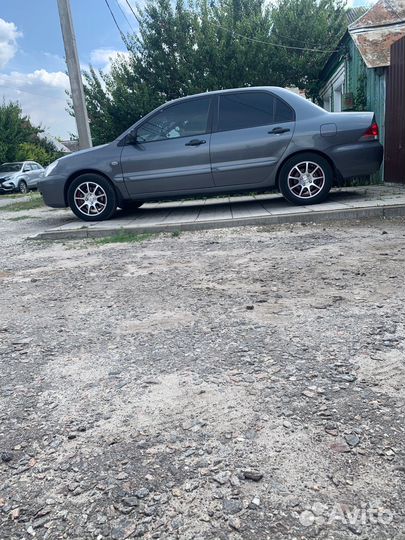 Mitsubishi Lancer 1.3 МТ, 2006, 240 000 км